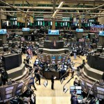 Wall St. falls 1 percent, weighed by commodity stocks
