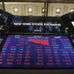 US stocks lower; Powell puts economy into the spotlight